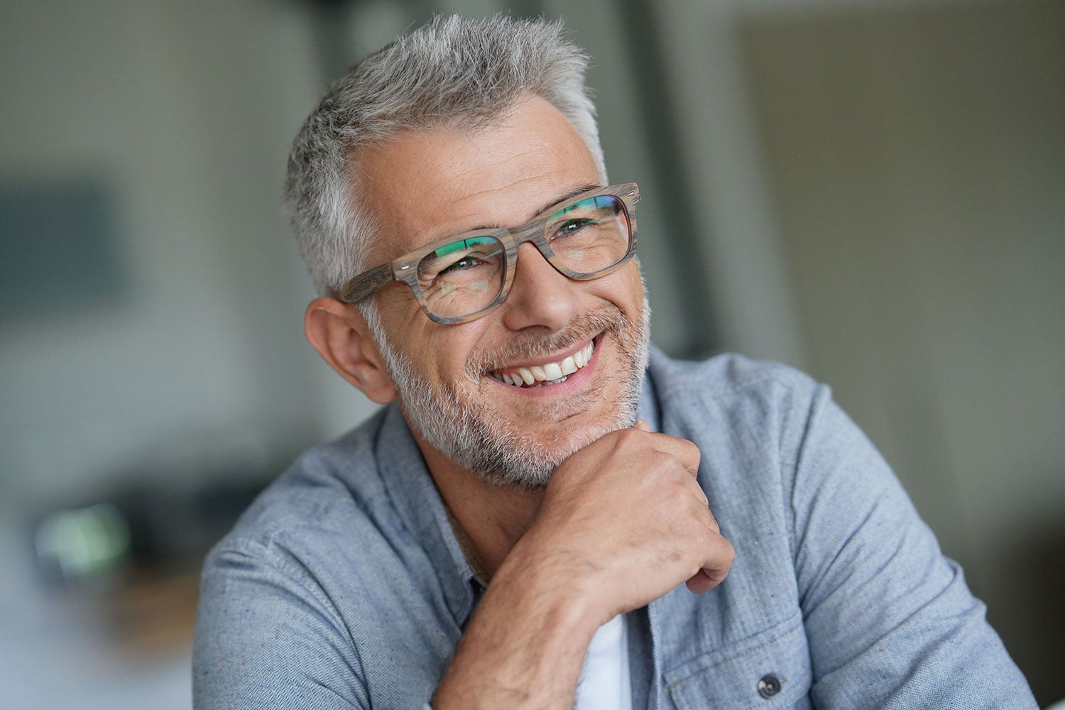 Advantages of dental bridge implant for replacing multiple missing teeth in Chicago near Printer's Row. Benefits of Implant Bridge in Chicago near Printer's Row